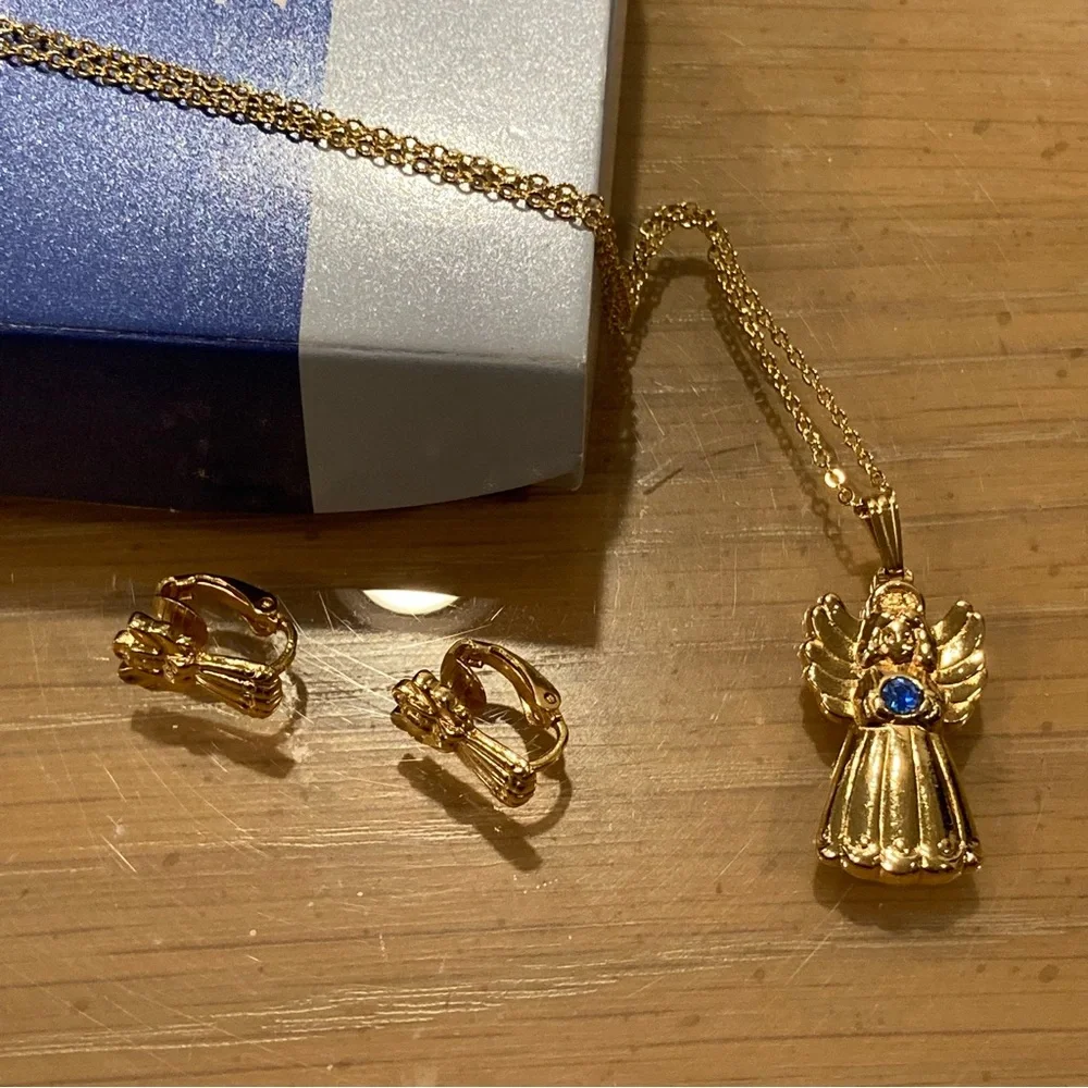 Vintage 90’s Avon Golden Heavenly Angel Pendant/Clip on Earrings. Blue Stone